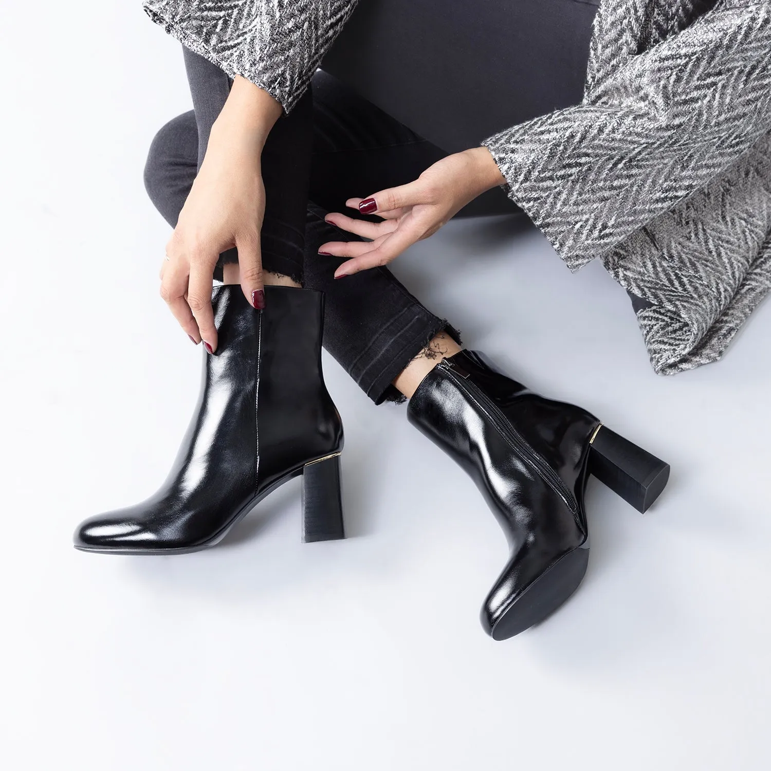 Adjustable Stilettos Ditto Ankle Boot | Black oiled leather
