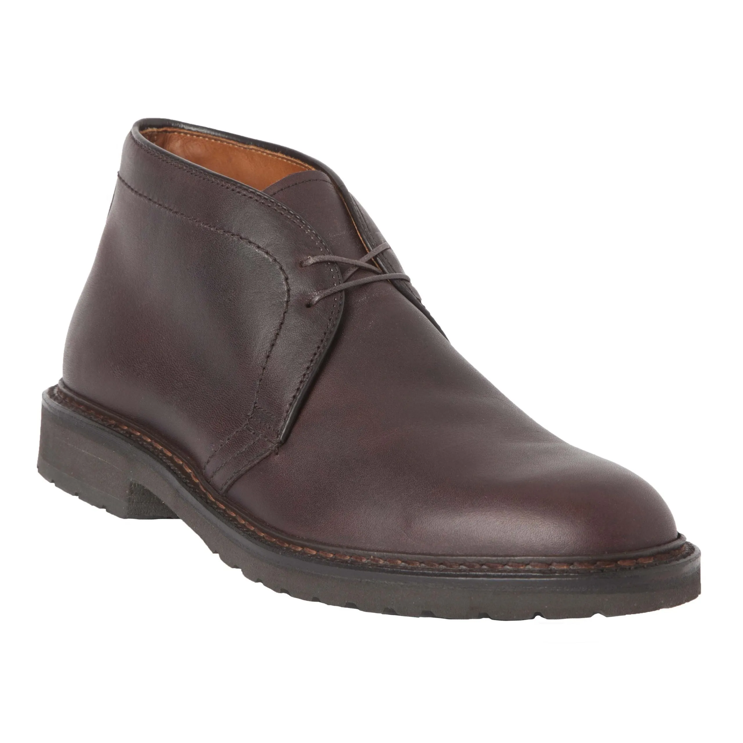 The Alden Madison 1272S Chukka Boot in kudu leather features a classic look with brown laces, two eyelets, a dark lug rubber sole, and is crafted on the Barried Last for a stylish and versatile appeal.