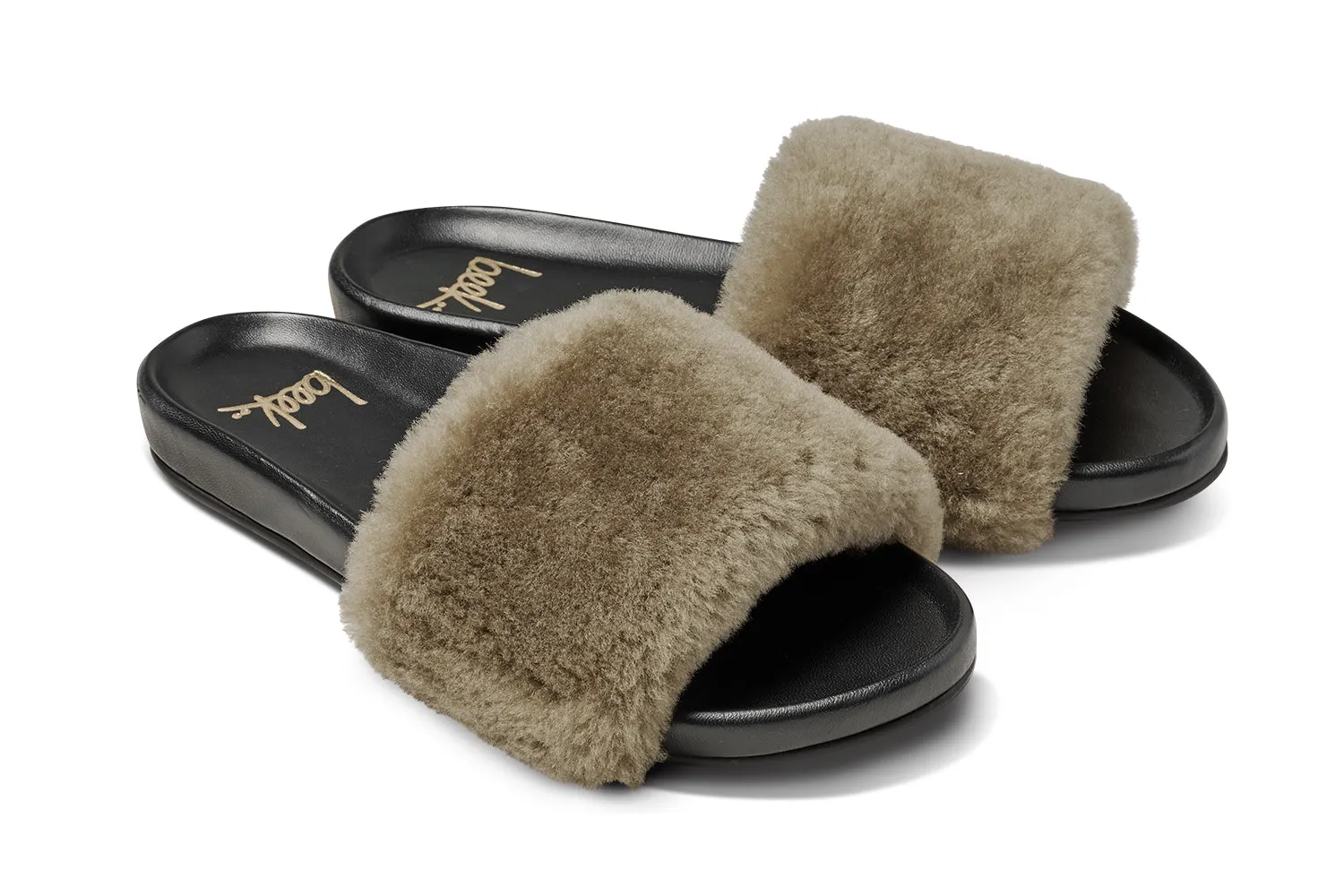 Gallito M??s Shearling slide sandals in bronze/black - product angle shot