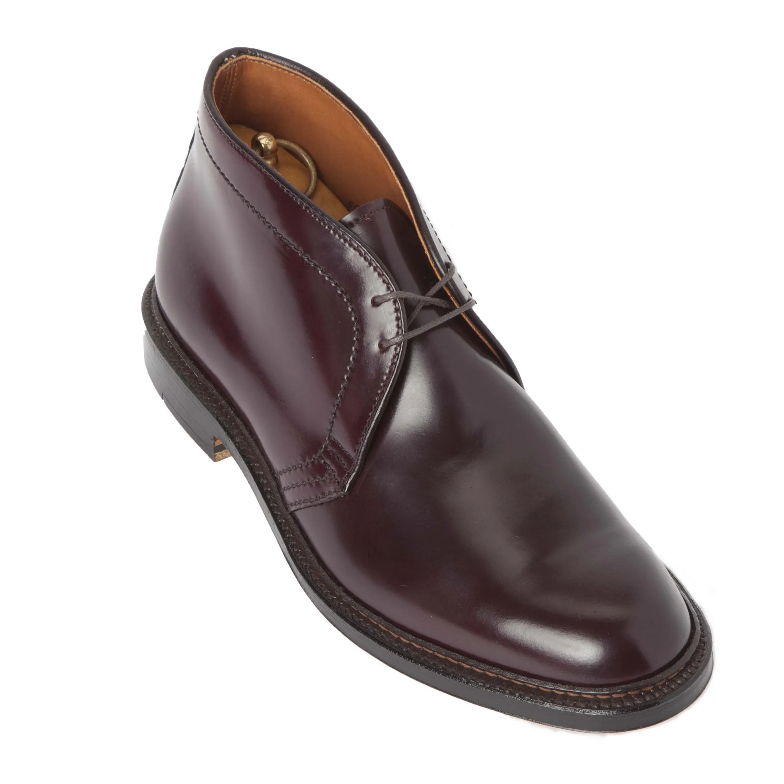 Alden Madisons 1339 - Chukka Boot in Color 8 Shell Cordovan features polished dark burgundy leather crafted on the Barrie Last, with lace-up closure, double oak leather sole, wooden shoe tree for shape enhancement, and contrasting tan interior lining.