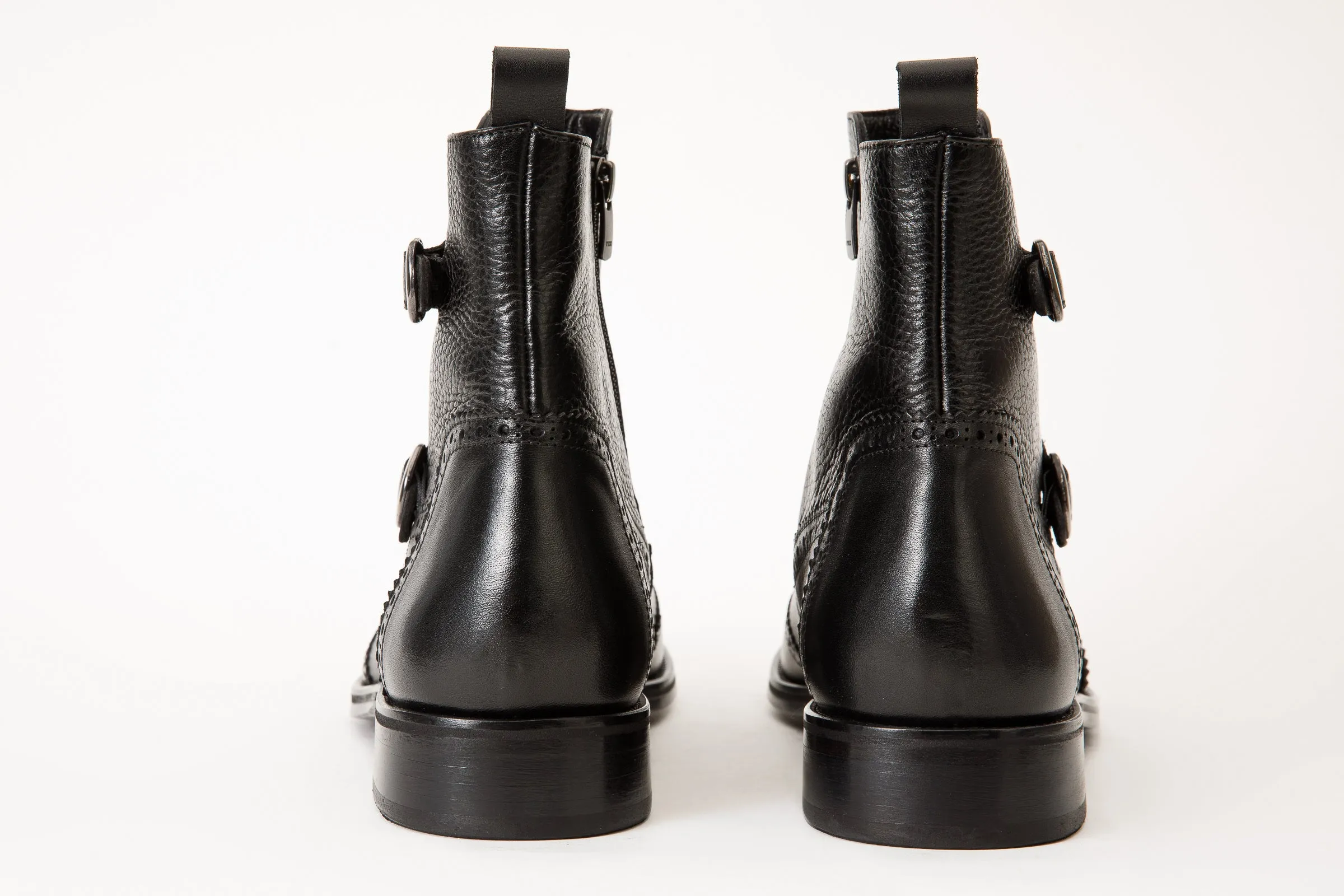 The Rand Black Leather Double Buckle Brogue Men Boot with a Zipper Edgy